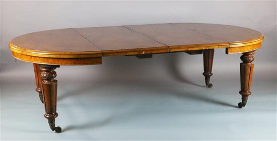 A Victorian figure and burr walnut extending dining table, W.4ft 6in. extends to 9ft 10in.